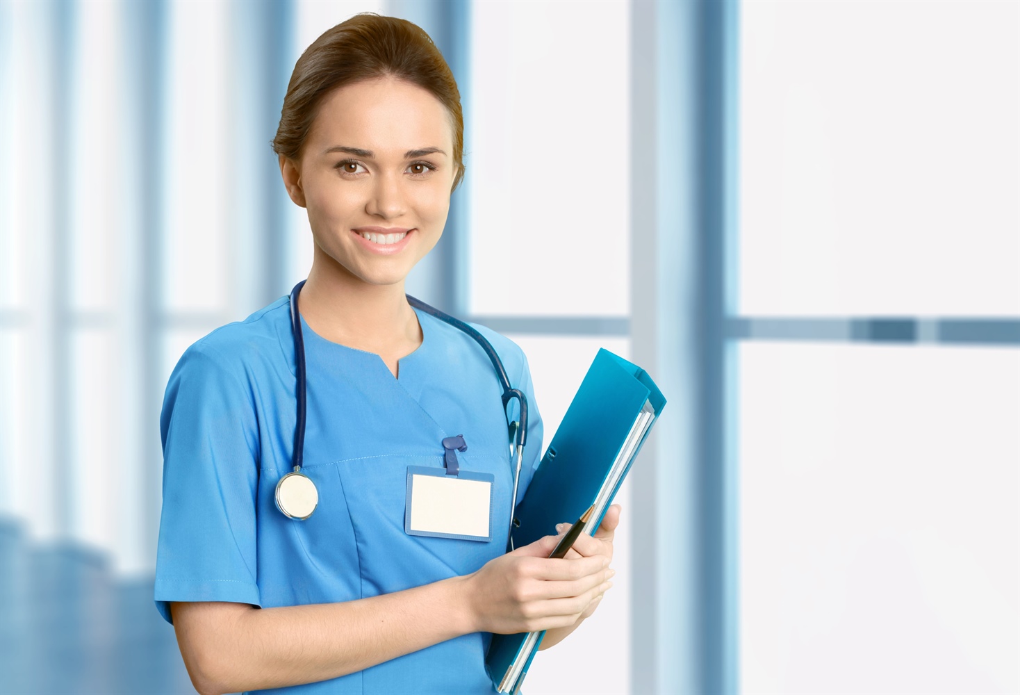 Nurse with insurance paperwork